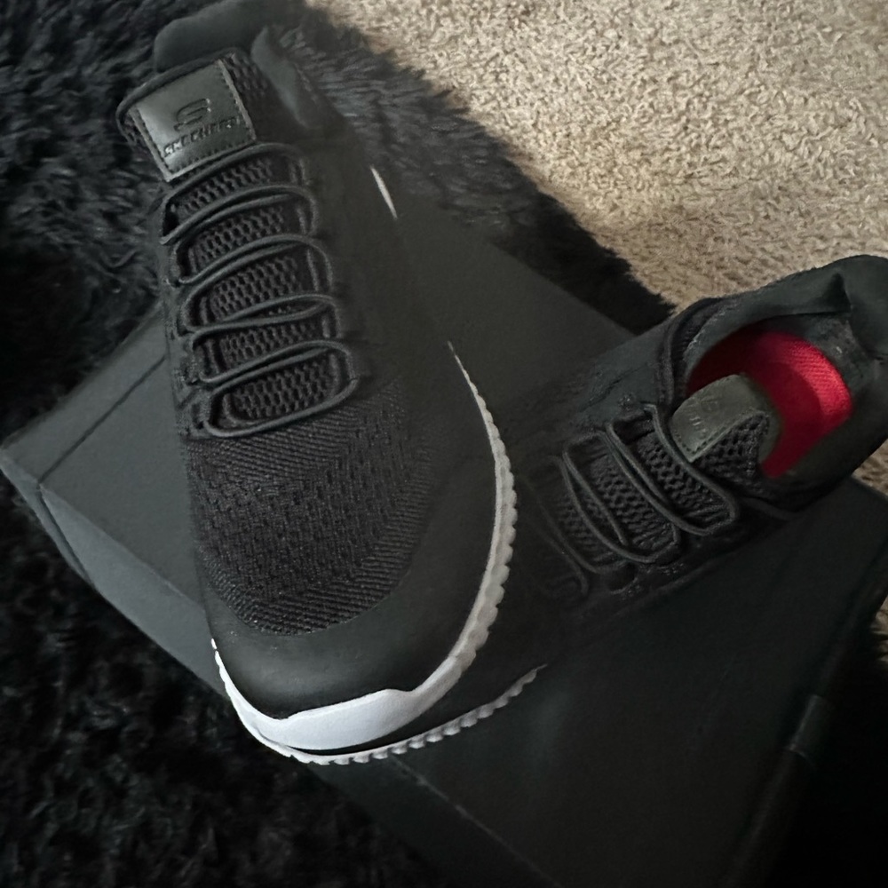 Black Skechers air cooled